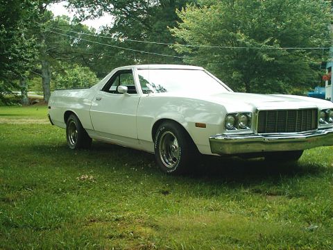 1975 Ford Ranchero - This 1975 Ford Ranchero is shown in a three-quarter front view, parked on a grassy lawn.