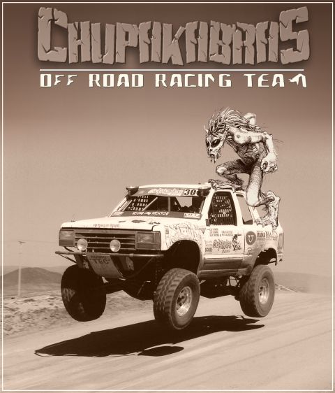 1992 Ford Explorer - A desert race truck with a mythical creature perched on its roof, advertising an off-road racing team.
