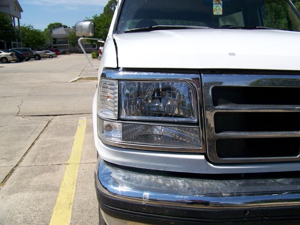 Front view of a 1995 Ford Bronco with chrome grille and headlights