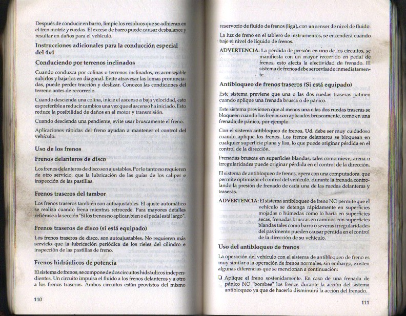Spanish Ford owner's manual page 110 and facing page on hill driving, brakes and rear antilock