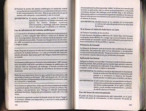 1995 Ford F-150 - This image shows an open book with Spanish text discussing vehicle braking systems and a "SUPERMOTORS" logo.