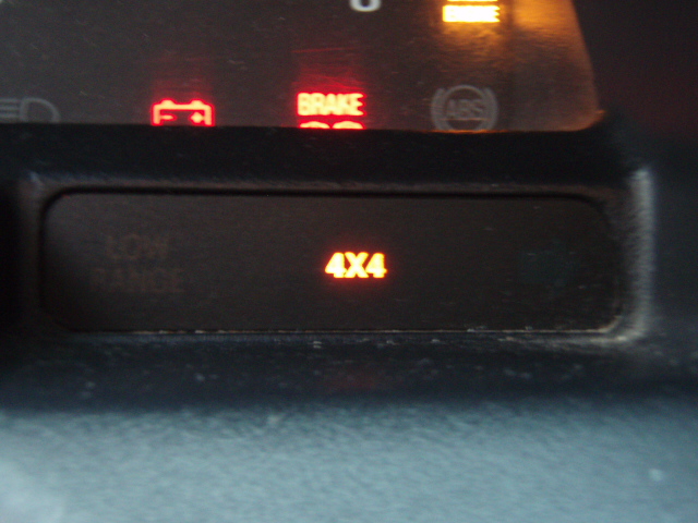 Illuminated 4X4 indicator on a dashboard message center
