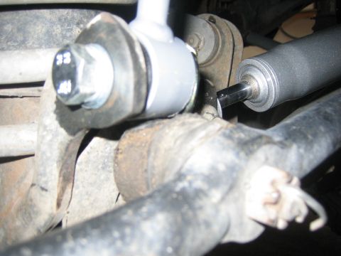 2001 Jeep Wrangler - A mechanical part of a vehicle is shown in a close-up view.