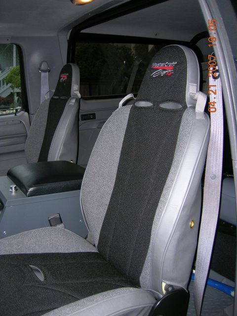 1996 Ford Bronco - Custom racing seats with MasterCraft branding are visible inside the vehicle's interior.