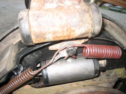 1996 Ford Bronco - old cylinders out (top), new ones installed (bottom)