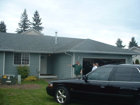 2000 Ford Crown Victoria - 2000 Ford Crown Victoria parked in front of a suburban house with garage.