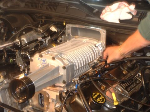 2000 Ford Crown Victoria - Supercharger installation in progress on a 32-valve V8 engine.