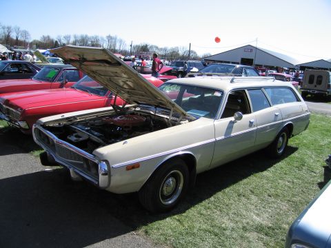 1991 Ford LTD Crown Victoria - Station wagon with hood open at an outdoor car show.