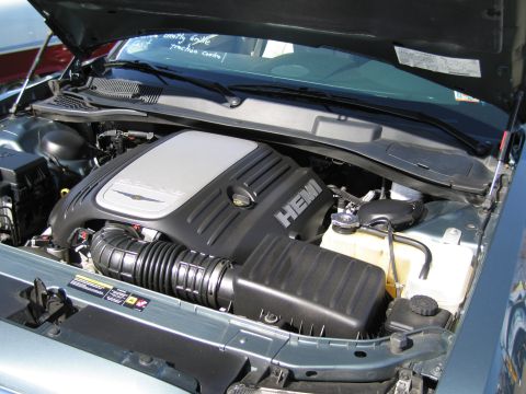 1991 Ford LTD Crown Victoria - Engine bay view of a Chrysler HEMI engine, showing the air intake and coolant reservoir.