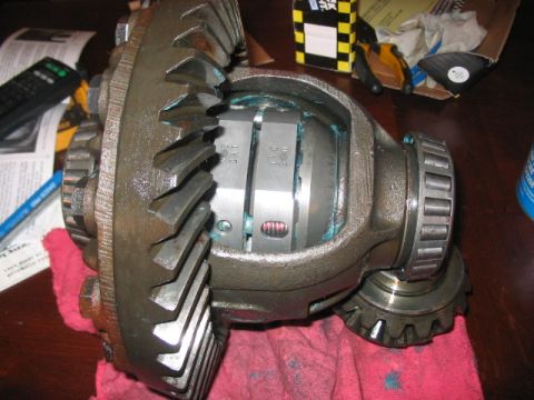 1991 Ford Bronco - A differential gear assembly is shown with its internal components and external gears.