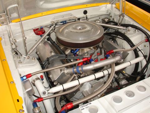 1993 Ford Taurus - Close-up view of a racing engine bay, a V8 engine with custom plumbing and a prominent air filter.