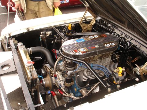 1993 Ford Taurus - Engine bay details of a classic car, a V8 engine with prominent 'COBRA' branding on the valve covers.
