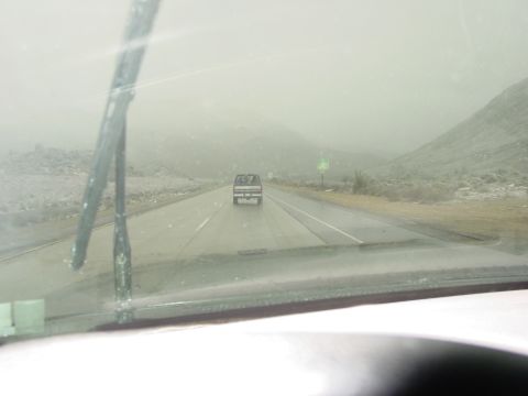 1994 Ford Bronco - Truck on highway in fog. View from inside another vehicle.