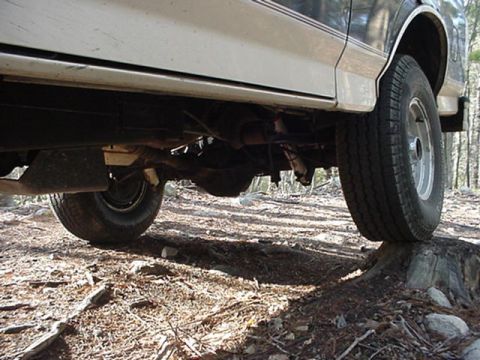 1993 Ford Bronco - This Ford Bronco's body style suggests an earlier model year than claimed, with its undercarriage and tires visible.