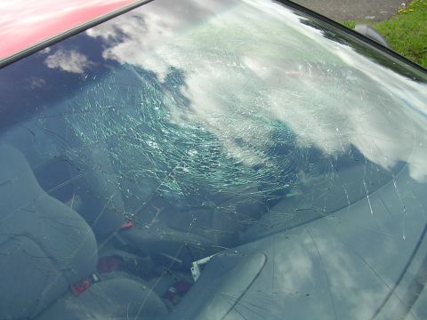 1996 Ford Probe - Broken windshield. Definately wouldn't be able to drive with that.