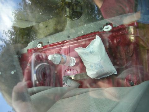 1996 Ford Probe - He had a bag of desiccant sitting in the car. The interior didn't smell funky at all. No signs of any leaks, either. Back seat is missing.