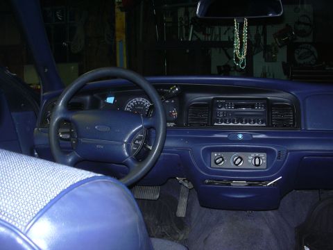 1996 Ford Crown Victoria - The interior of a 1996 Ford Crown Victoria is shown, the dashboard and driver's seat.