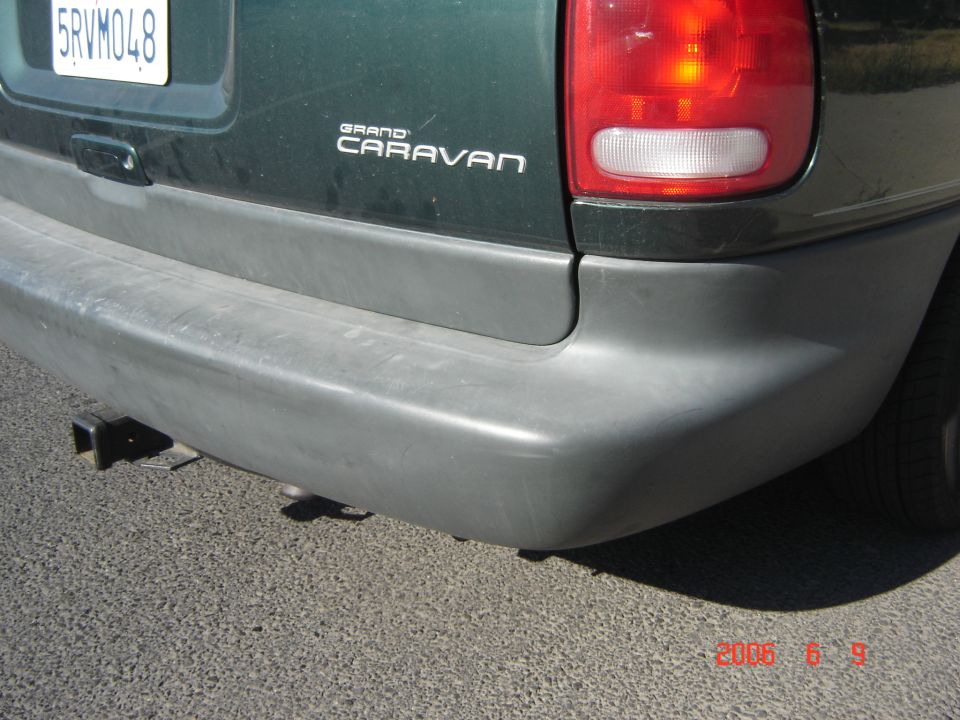 1997 Dodge Grand Caravan rear bumper with hitch receiver and taillight