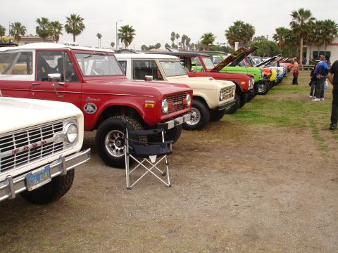 1993 Ford Taurus - Several generations of Ford Broncos are lined up for display.