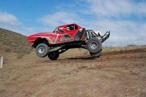 1992 Ford Explorer - This custom off-road truck is mid-air during a race event.