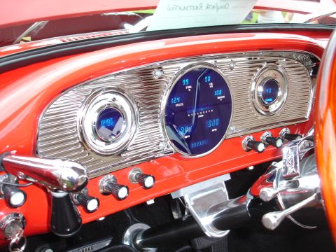 1993 Ford Taurus - A custom dashboard features bright blue digital gauges displaying various vehicle metrics.