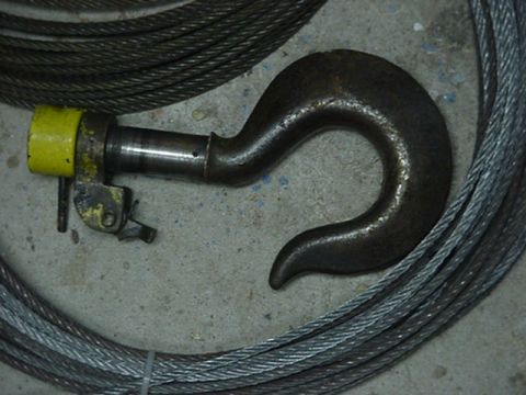 1993 Ford Bronco - A heavy-duty tow hook is shown with coiled cables, suggesting its use in towing or recovery operations.