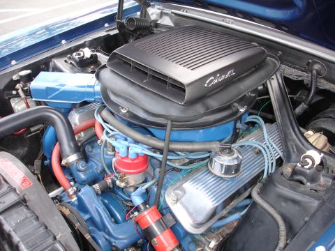 1993 Ford Taurus - Engine bay detail a Cobra II air intake, not a 1993 Ford Taurus.