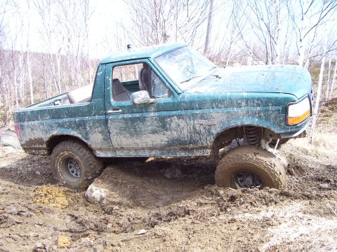 1996 Ford Bronco - This 1996 Ford Bronco is deep in the mud, its off-road capabilities.