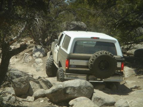 1994 Ford Bronco - This 1994 Ford Bronco navigates a challenging rocky terrain, its off-road capabilities.