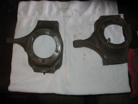 1991 Ford Bronco - Two cast iron differential housing components are shown laid out on a white cloth.