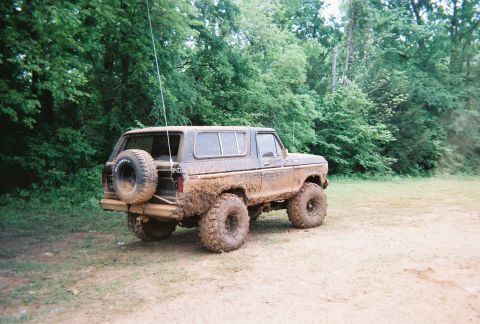 1978 Ford Bronco - This 1978 Ford Bronco is covered in mud, suggesting it has been used for off-roading.