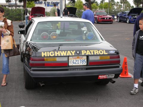 1992 Ford Crown Victoria - This 1992 Ford Crown Victoria police car is seen from the rear, displaying "HIGHWAY PATROL" on its trunk.