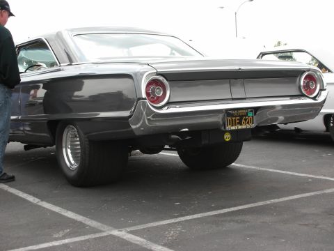 1992 Ford Crown Victoria - Rear view of a modified 1963 Ford Thunderbird with large rear tires and custom wheels.