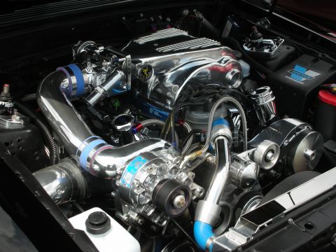 1992 Ford Crown Victoria - Engine bay features a polished chrome supercharger and intake piping with blue accents.