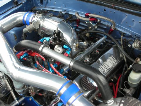1992 Ford Crown Victoria - Customized engine bay shows polished components and performance parts.