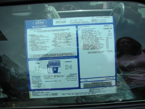 1992 Ford Crown Victoria - Window sticker details for a 1992 Ford Mustang Cobra, including standard and optional equipment pricing.