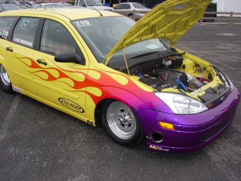 1992 Ford Crown Victoria - This modified station wagon features flame decals and a two-tone paint job with a purple front end.