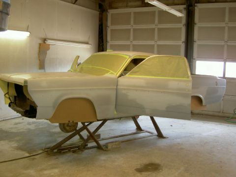 1967 Ford Ranchero - Body of a 1967 Ford Ranchero is prepped and masked for paint in a booth.