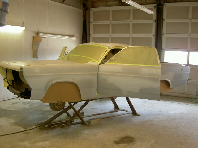 1967 Ford Ranchero body on stands, masked for painting