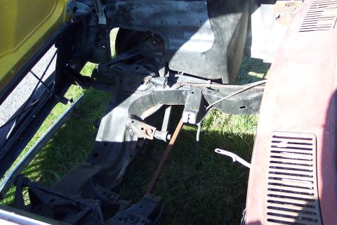 2001 Ford Crown Victoria - Unidentified vehicle's chassis and engine bay components are shown in this close-up view.