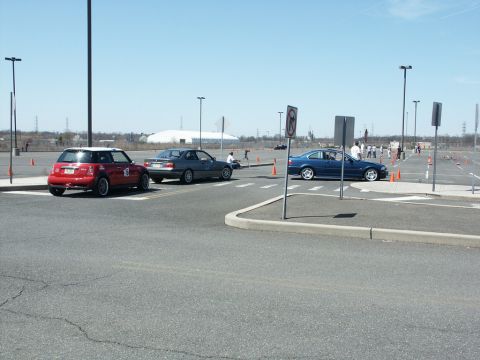2001 Mercury Grand Marquis - Autocross event with multiple cars participating on a sunny day.