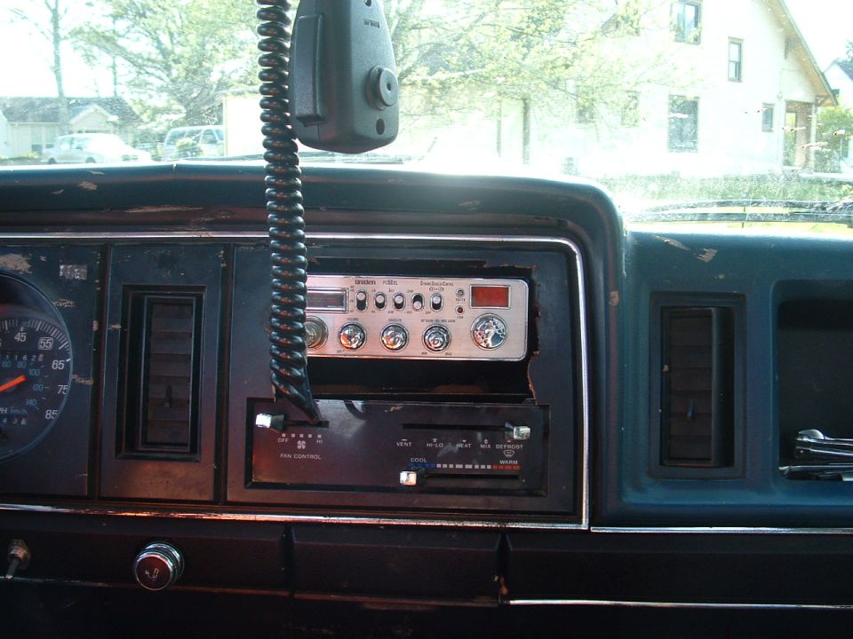 Dashboard interior with CB radio and fan controls