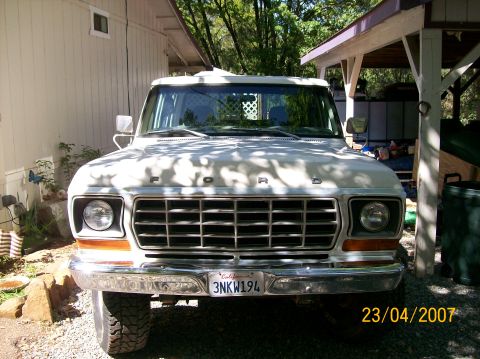 1978 Ford F-250 - This 1978 Ford F-250 is shown from the front, parked in a driveway with a covered area to the right.