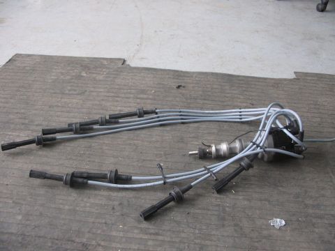 1964 Ford 427 - Spark plug wires and distributor assembly, likely for an older vehicle.