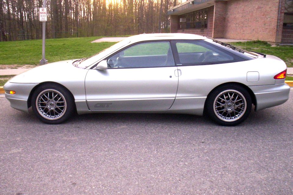 Silver Ford Probe GT coupe parked in profile