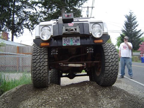 1989 Ford Bronco - Front view of a modified 1989 Ford Bronco with a winch and off-road tires.