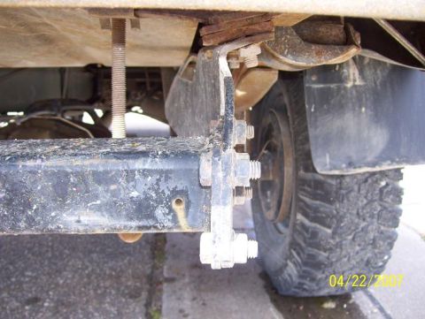 1996 Ford F-350 - Undercarriage view of a truck's frame and suspension components.