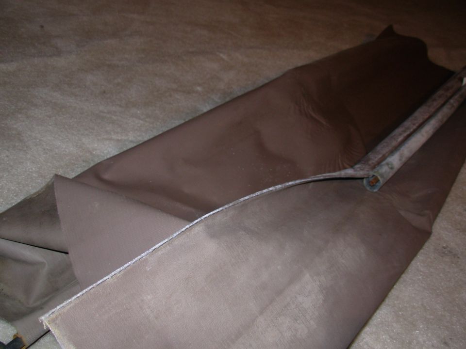 The plastic might be adhered to the drum, so it may be necessary to flex it to break it loose.