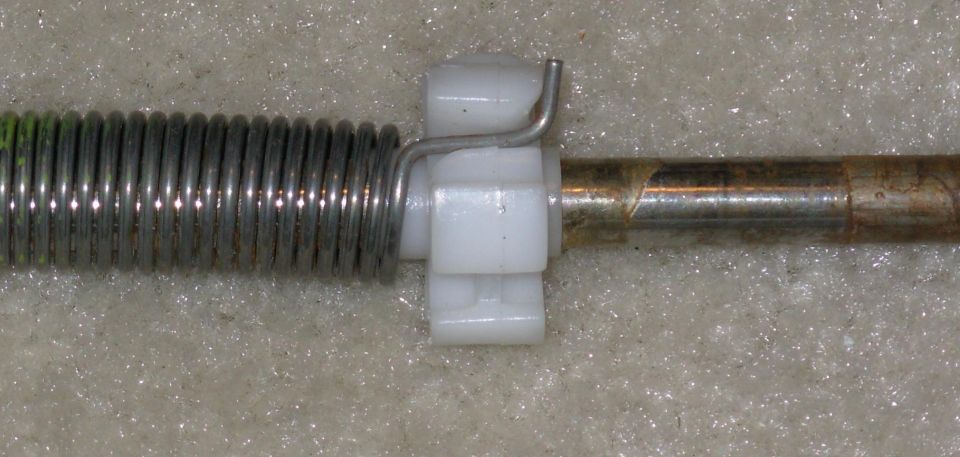 The bearing pops loose from the spring, but be sure to replace it in this direction.
