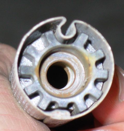 1983 Ford Bronco - The large black bearings support the weight of the cover, and should slide freely inside the drum up to the punched tab stops.